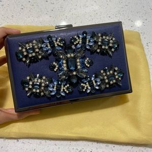 Blue bejewelled clutch